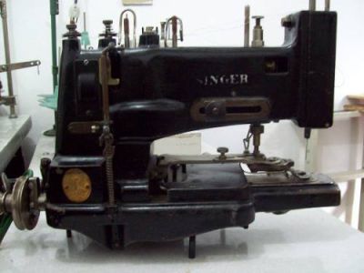 maquina botoneira singer