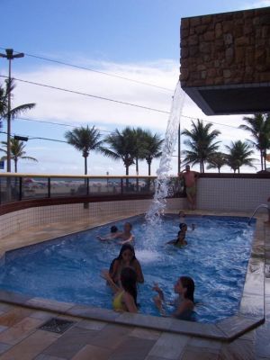 TEMPORADA-Apartamento frente ao mar com piscina - PRAIA GRANDE