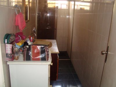 TROCO APTO POR 1 CASA NAS IMEDIAÇÕES CENTRO GUARULHOS SP