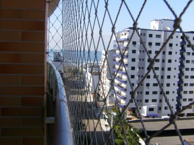 Criança Feliz na Praia Grande