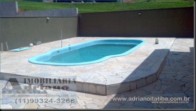 Casa residencial em condomínio fechado no interior