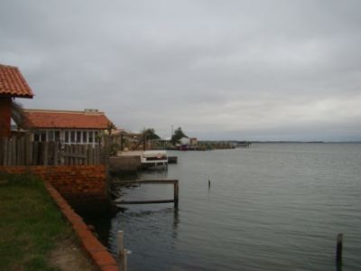 TERRENO BARRANCA DE RIO CENTRO TRAMANDAÍ COM ESCRITURA