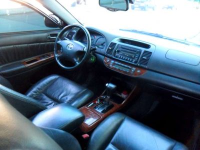 Toyota Camry blindado o'gara de presidencia troco x terra sw4