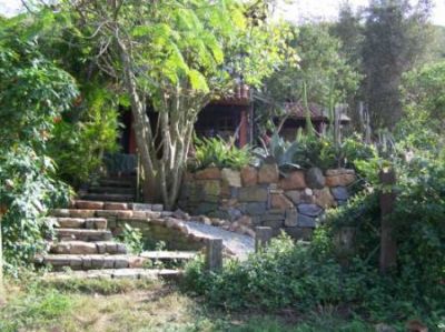 linda casa rustica em frente a praia