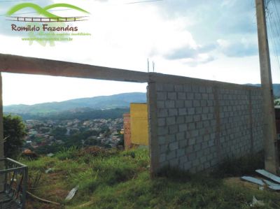 lote plano em ibirite todo murado