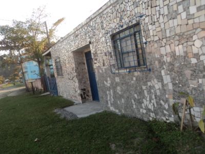 VENDO TERRENO COM 2 CASAS POMAR COM ÁRVORES FRUTÍFERAS E FLORES