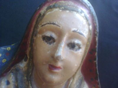 Escultura em madeira policromada