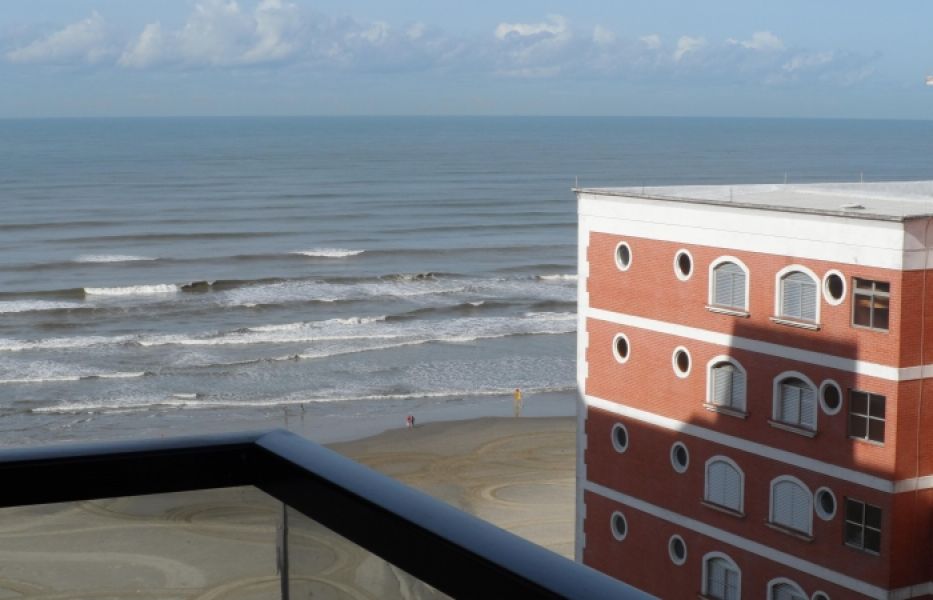 Cód. T003 Prédio frente ao mar apto c/ vista lateral 1 dormitório