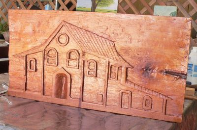 Entalhe, escultura e placas em madeira