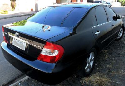 Toyota Camry blindado o'gara de presidencia troco x terra sw4